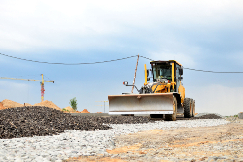 construction machine motor grader at a construction site